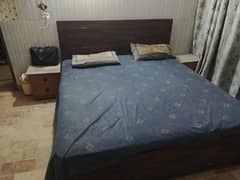 Bedset with mattress, sidetables, Almirah and dressing table.