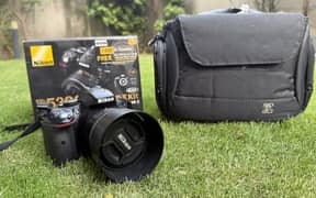 Nikon D5300 with 50mm F1.8 lens included box charger and bag.