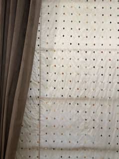 Jacquard’s fabric blind and velvet curatain