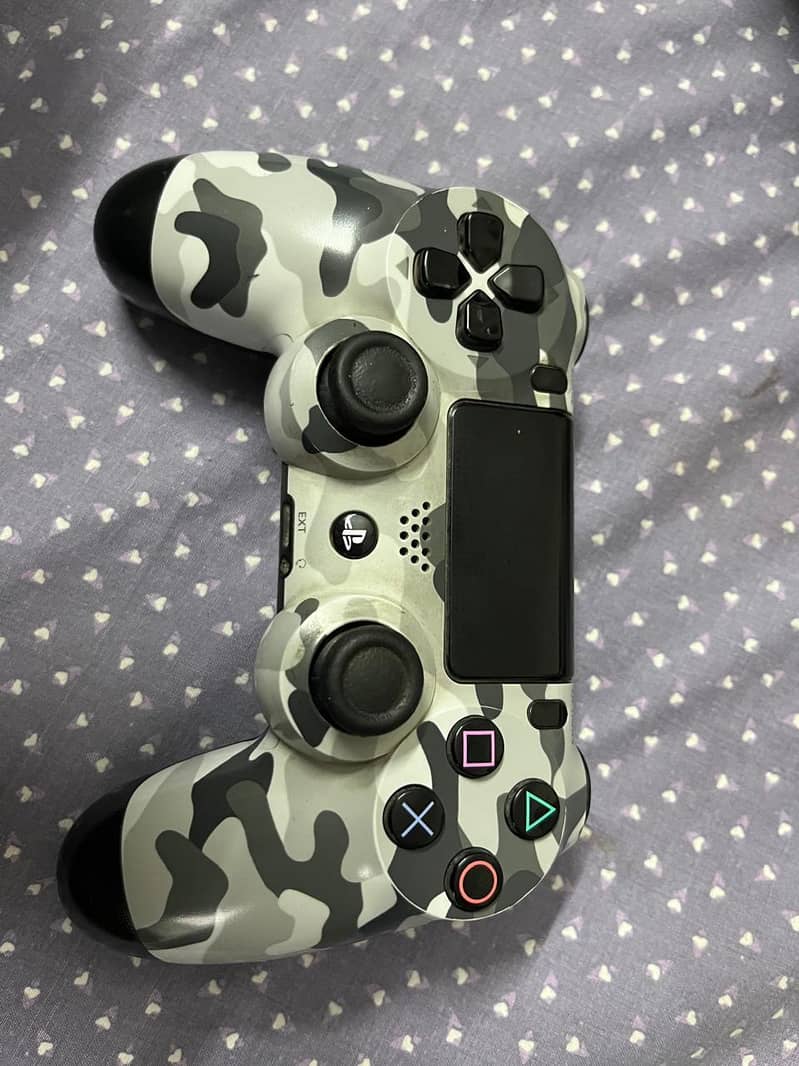 Playstation 4 slim with controllers and disks 4