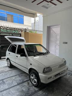 2018 Model Mehran white colour  Lahore number