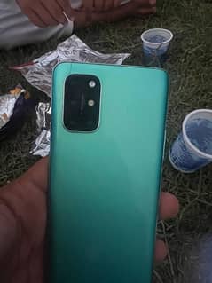 oneplus 8T one green line and a small dot