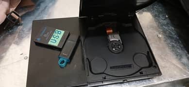 ps2 amazing condition (jail break usb+ memory card with 15 games)