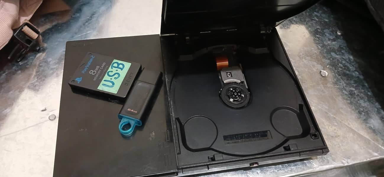 ps2 amazing condition (jail break usb+ memory card with 15 games) 0