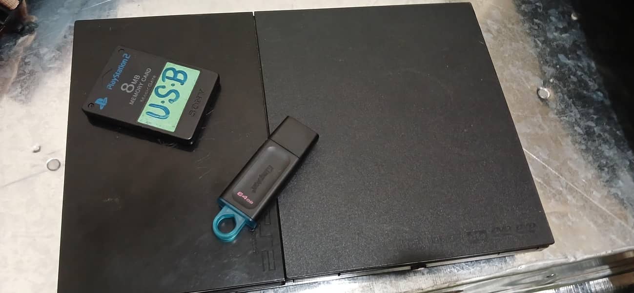 ps2 amazing condition (jail break usb+ memory card with 15 games) 1