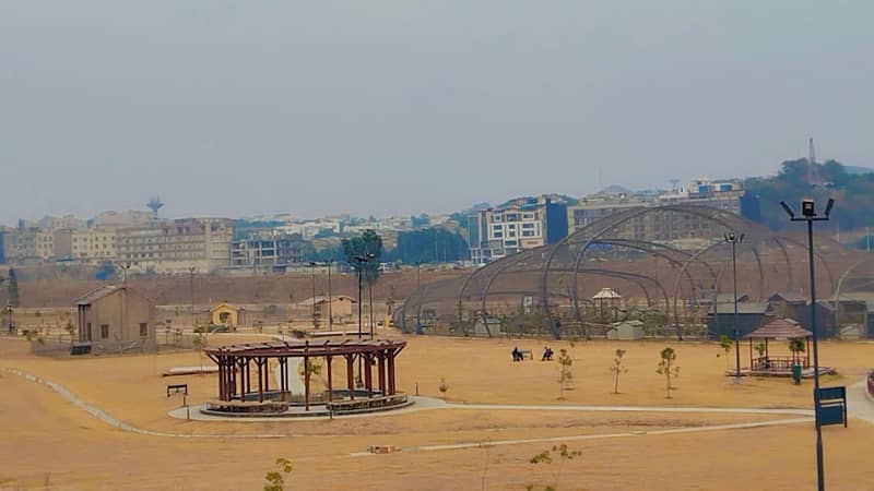 8 Marla 3 side corner plot available for sale at ideal location in Dha 4 2
