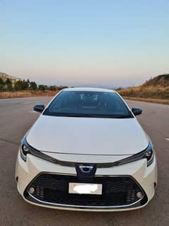 corolla hybrid 2020 perl white