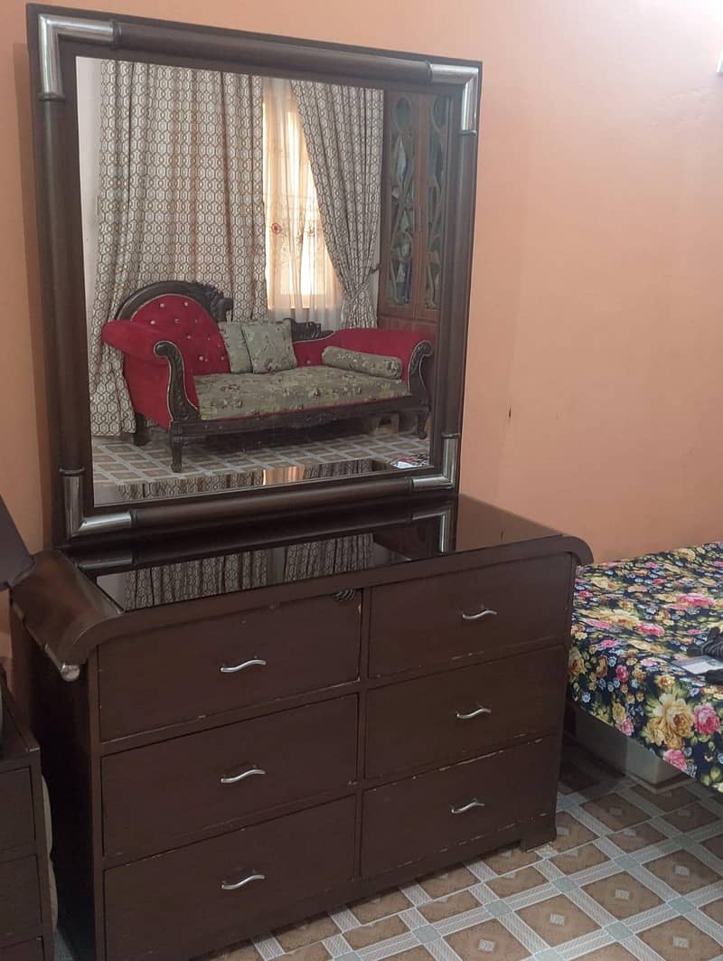 One Big Bed And two Side tables And One mirror Table and one table and 9