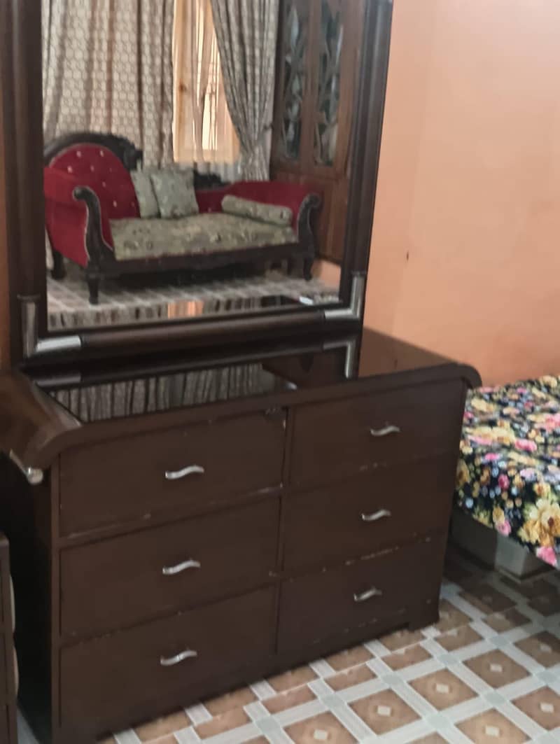 One Big Bed And two Side tables And One mirror Table and one table and 12