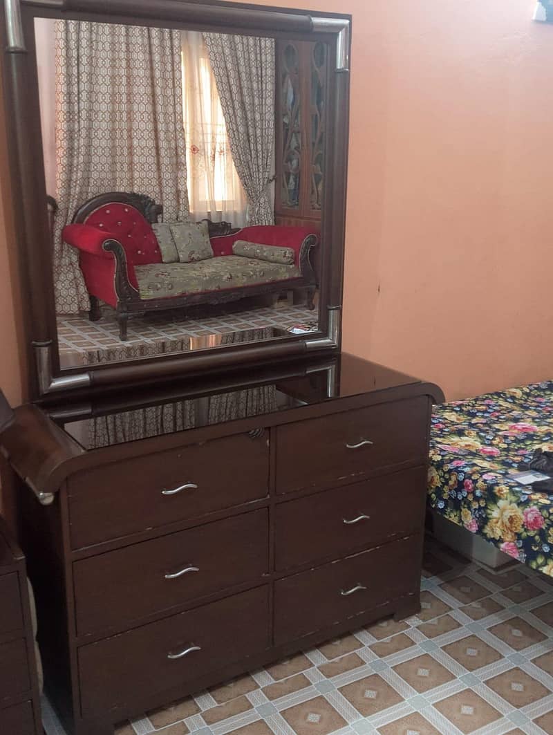 One Big Bed And two Side tables And One mirror Table and one table and 13