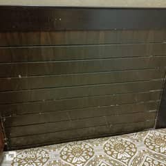 single wooden bed