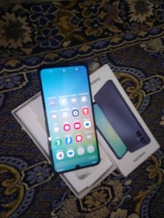 Samsung A06(4/64) only 2 months used 10 months warranty complete box.