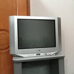 Sony color TV with trolley in good condition for sale