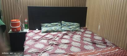 king size bed with side tables and dressing