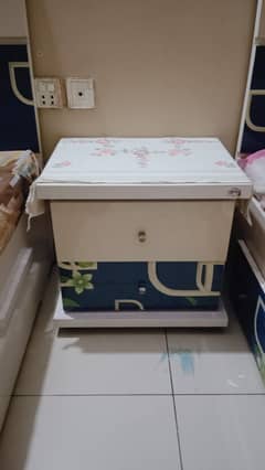 beds and cupboard with side table and metress