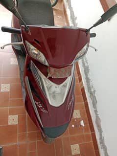 united scoty 100cc colour mehroon
