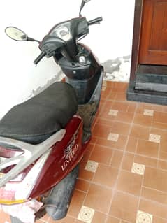 united scoty 100cc colour mehroon