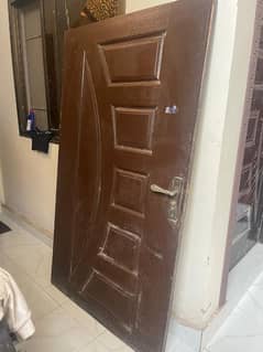 wooden door and dressing table without mirror