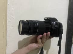 Canon EOS 550D DSLR Camera with 75–300mm Lens & Charger
