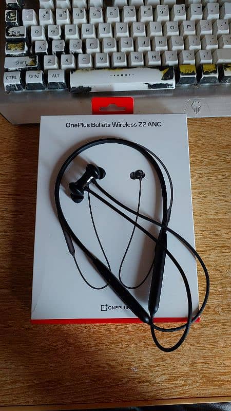 One plus bullets z2 anc, box opened neckband earbuds 0