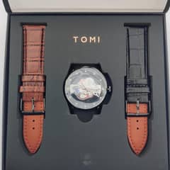 Tomi