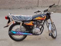 Honda 125 Model 2021  Number laga huwa hy (AHW 1099)