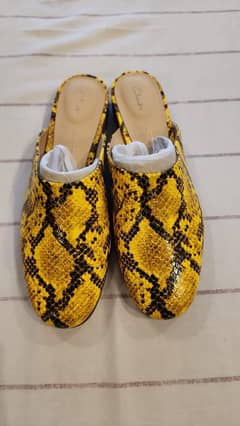 Original brand new Clarks yellow snakeskin leather mules.