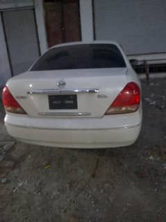 2006 mode sunny nisaan white colour outer showered main no accident