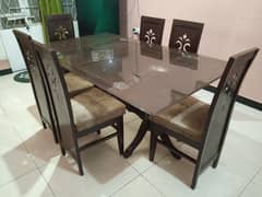 Wooden Dining Table with six chairs.