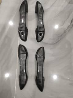 Carbon fibre door handles