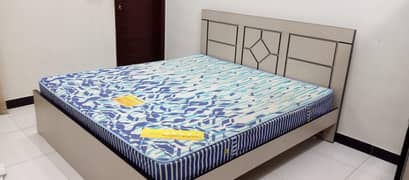 Queen size comfortable bed with soft mattress