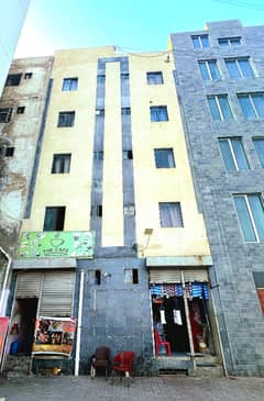 100 Square Yard Residential Building Is Available For Sale In Muslim Commercial Area Karachi