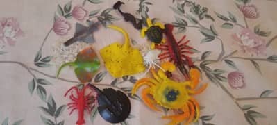 Toy insects , baby fish , pop it , lopsi doll