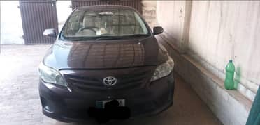Toyota Corolla Gli 2012 red wine colour