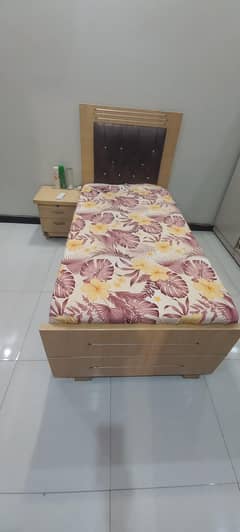 single bed with side table or mattress