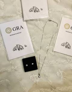 "There are 2 diamond sets, both made with original pure 1-carat diamon