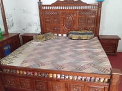 Kingsize bed with two side tables