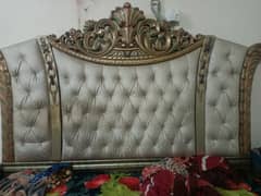 Wooden bed with quilting