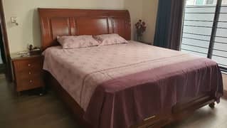 Bed with side tables