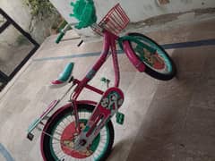 A brand new pink Barbie cycle for girls