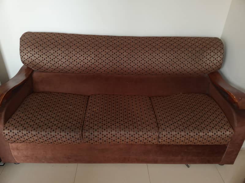 brown colour sofa set. 0