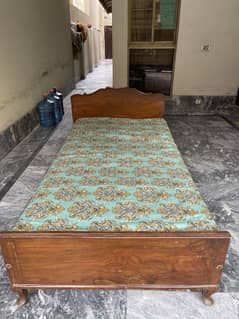 Two wooden Single Beds