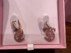 Swarovski earings.