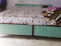 2 pieces wooden bed with mattresses, with two sides tables