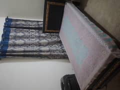 Wooden single bed