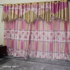 Beautiful pink and golden silk curtains