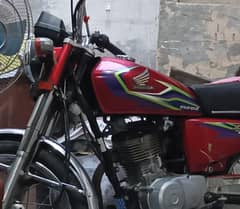 Honda 125 red color