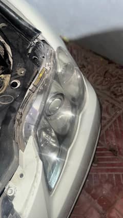 Mark X left headlight