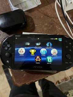 PlayStation Vita with games