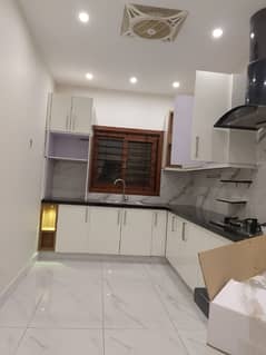 Brand New ground floor portion for rent tiled flooring America kitchen 24 hours water and electricity
